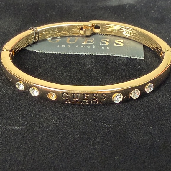 GUESS Gold and Silver Heart Earrings and bracelet set - Picture 7 of 7